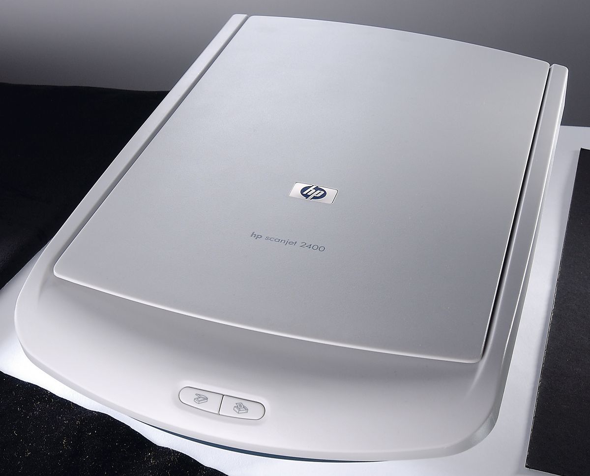 A photo of an HP Scanjet 2400 scanner with video stabilizer features.