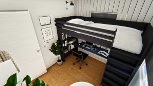 A bedroom with a loft bed, desk, and storage underneath the bed to maximize the use of space.