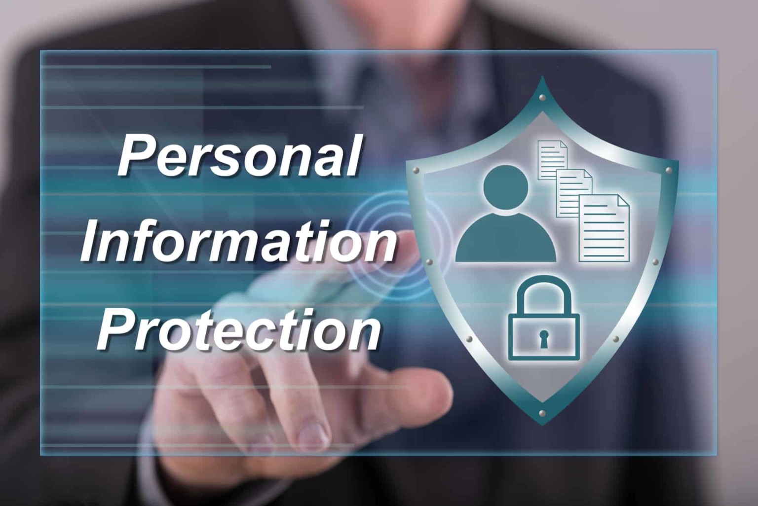 A person in a suit is shown touching a blue and gray icon of a shield with a person-shaped keyhole and two paperclip-shaped attachments over the words 'Personal Information Protection'.